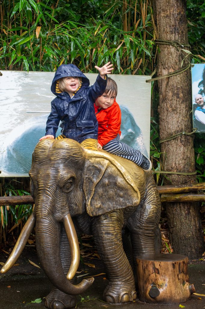 Kids on top of elephant sculpture at DierenPark Amersfoort by Beatrice Murch
